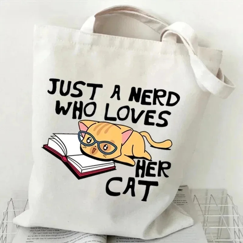กระเป๋าผ้าแคนวาสลายแมวและหนังส - Tote Bag Canvas Print บทวิจารณ์และราคา